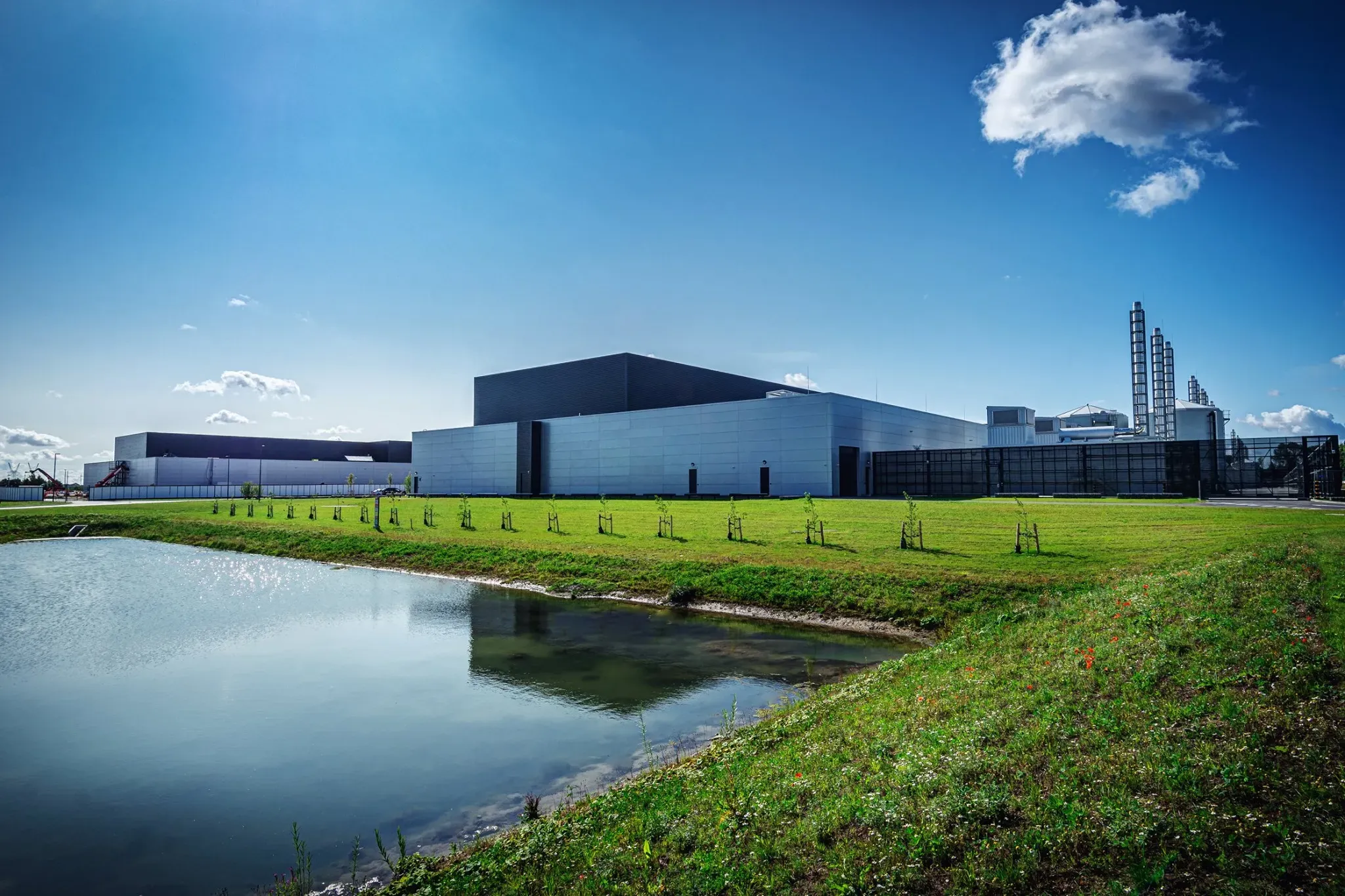 
Meta's data center in Odense, Denmark.
<br>
Such data centers pack enough compute
to allow companies to train large AI models,
they also have significant carbon footprints.
